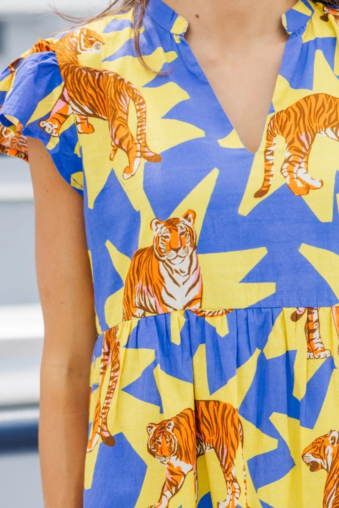 Briton Court: The Standout Yellow Tiger Dress